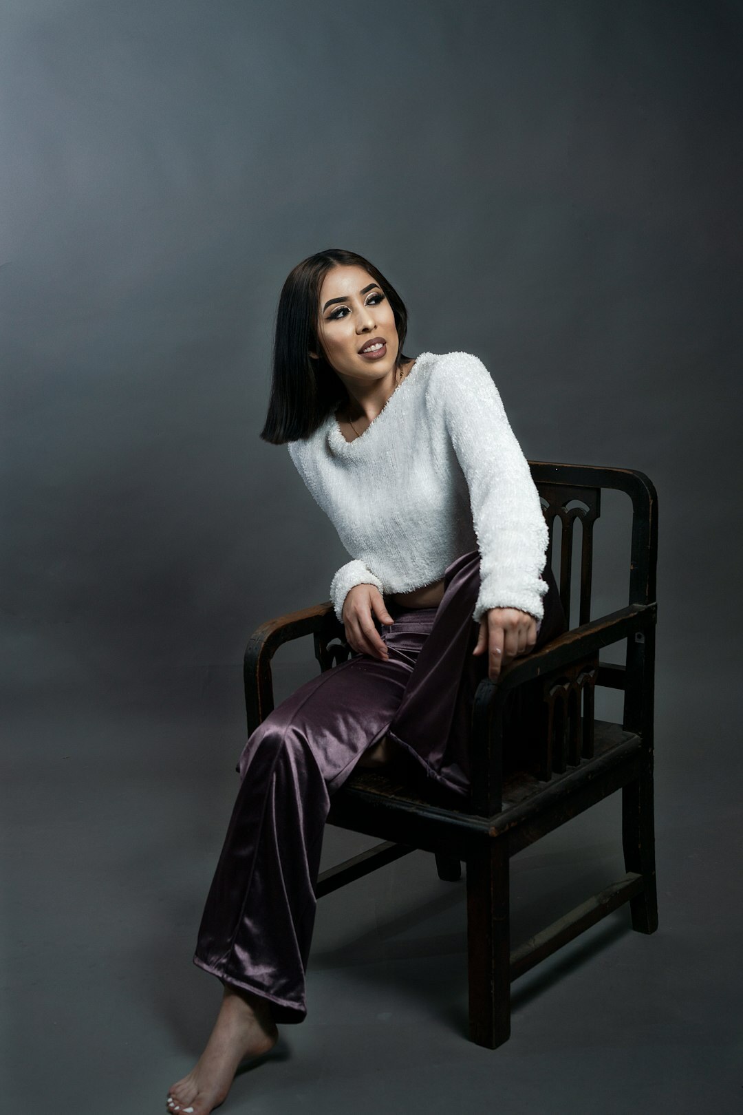 Studio portrait of a woman in her fifties, real estate founder
